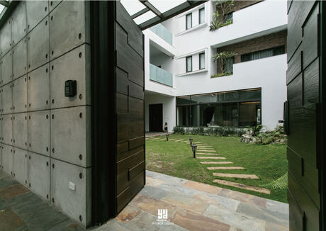 清水模砌牆做為大門入口-台中芽米設計自地自建精選案例