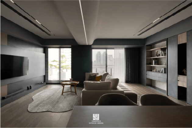 泰御天鑄公領域設計：針對室內中央大樑，芽米設計採用圓弧造型天花板與深色量體退縮手法，優化空間高度比例並引導視覺流線。