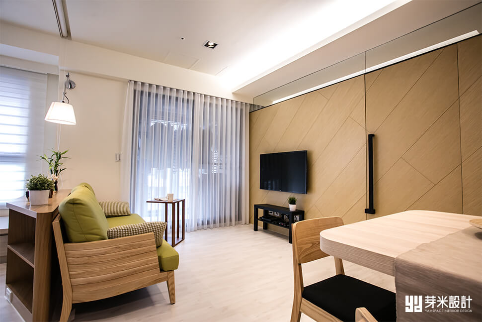 綠色系與木材質搭配的客廳-台中室內設計公司